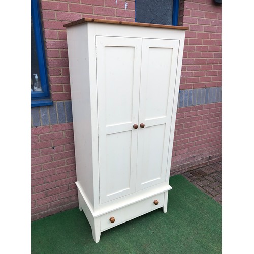 73 - Single pine wardrobe with bottom draw on stand in white