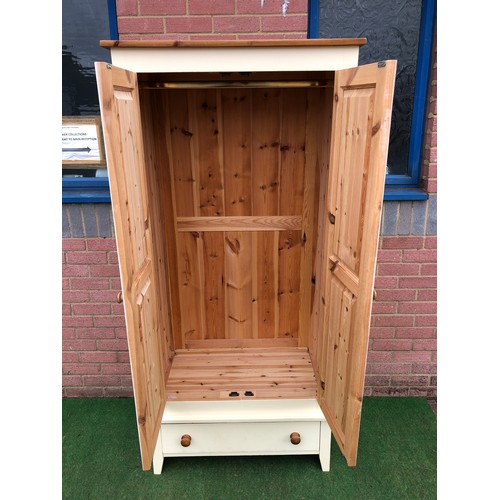 73 - Single pine wardrobe with bottom draw on stand in white