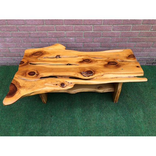 77 - Coffee table in a rustic burr wood finish
