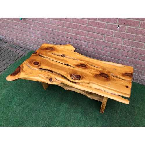 77 - Coffee table in a rustic burr wood finish
