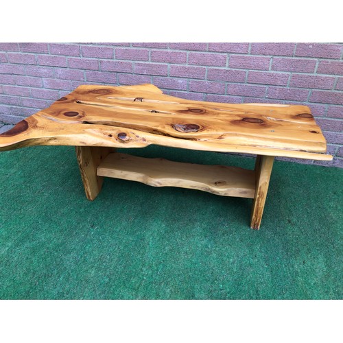 77 - Coffee table in a rustic burr wood finish