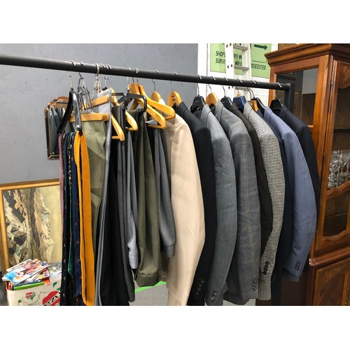 92 - A collection of gentleman's attire consists of 9 suite jackets, 14 trousers, 18 ties and a waist coa... 