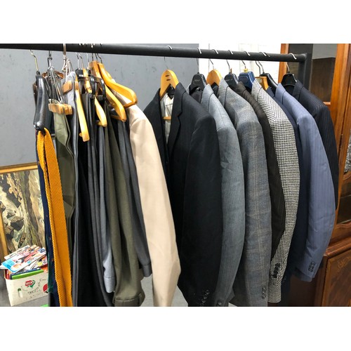 92 - A collection of gentleman's attire consists of 9 suite jackets, 14 trousers, 18 ties and a waist coa... 