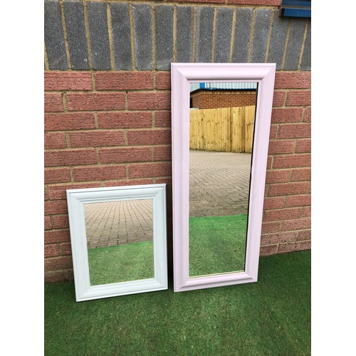 97 - Two wall hanging mirrors a smaller square grey one with a larger rectangular lilac