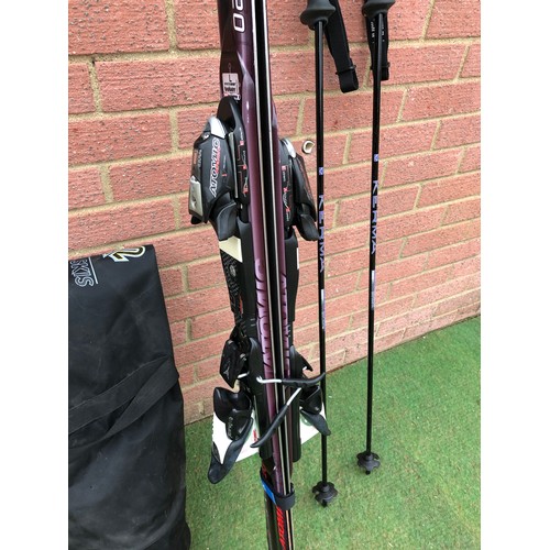 117 - Pair of Adult ATOMIC Bcrav X 9.20 skis and a pair off KERMA ski poles with black carry bag (see all ... 
