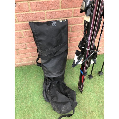 117 - Pair of Adult ATOMIC Bcrav X 9.20 skis and a pair off KERMA ski poles with black carry bag (see all ... 