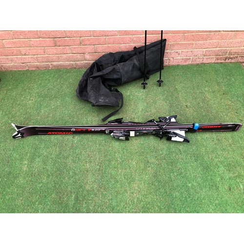 117 - Pair of Adult ATOMIC Bcrav X 9.20 skis and a pair off KERMA ski poles with black carry bag (see all ... 