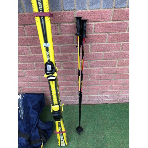 118 - Pair of childs TECNO Pro CARVE 20 skis and a pair of TECNO power ski poles with a blue carry bag (se... 