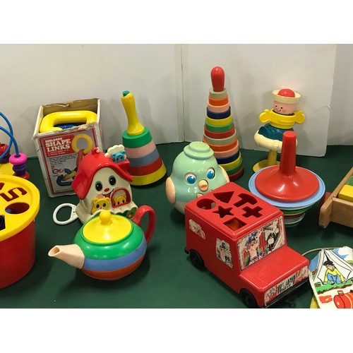 33 - Collection of vintage fisher price and other infant toys  ( see all pictures )