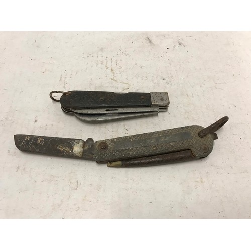 115 - 1 x military pocket work knife and one other used