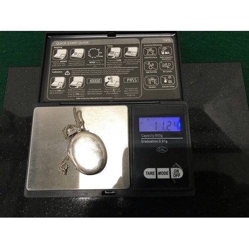 52 - 925 stamped silver locket & chainTotal Weight 11.24g