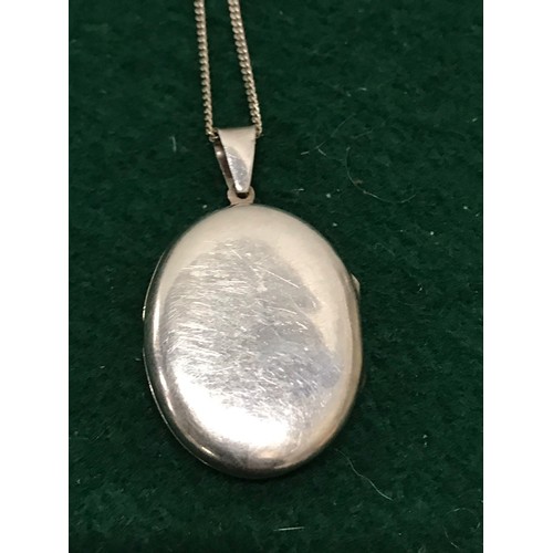 52 - 925 stamped silver locket & chainTotal Weight 11.24g