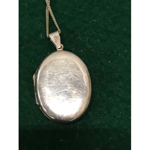 52 - 925 stamped silver locket & chainTotal Weight 11.24g