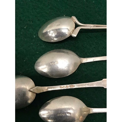 49 - 4 x silver hallmarked golf related spoons see all picturesTotal weight 57.12g