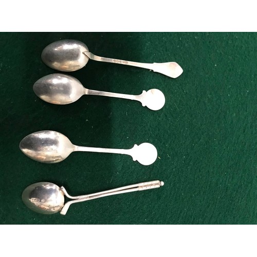 49 - 4 x silver hallmarked golf related spoons see all picturesTotal weight 57.12g