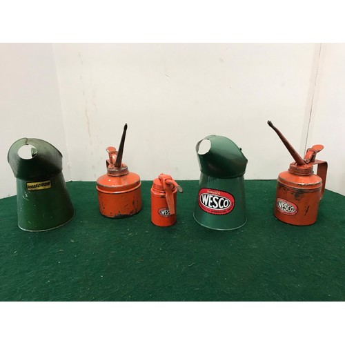 207 - Five mixed oil cans With advertiseing