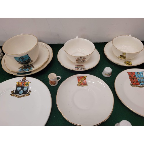 198 - Qty of crested ware with cups, saucers and plates