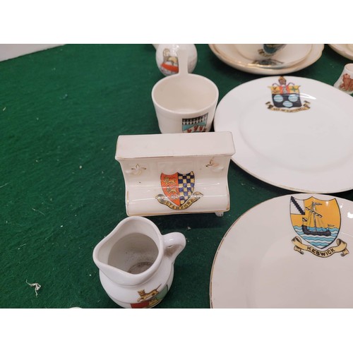 198 - Qty of crested ware with cups, saucers and plates