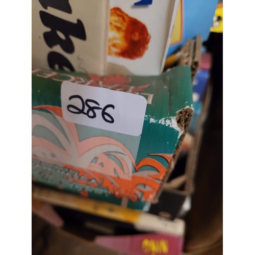 286 - 4 boxes of books