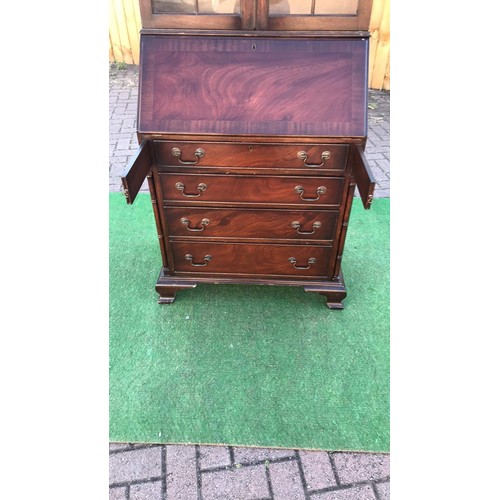 110 - Georgian style mahogany bureau bookcase with draws and gun barrel columns and internal gallery compa... 