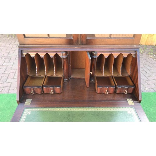 110 - Georgian style mahogany bureau bookcase with draws and gun barrel columns and internal gallery compa... 