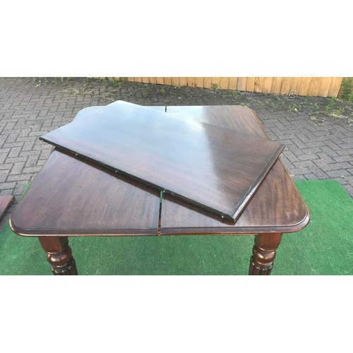 111 - Victorian mahogany wind out extending dining table with leaf