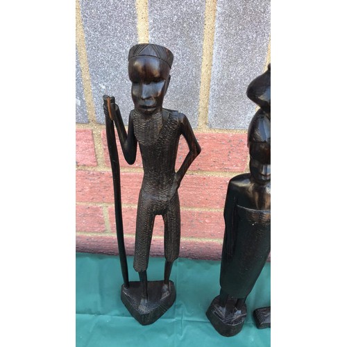 32 - 3 African carved figures ( one has damage )