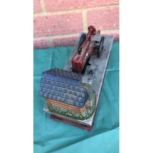 34 - Tractor money box in cast metal