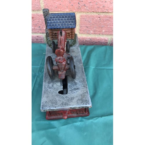 34 - Tractor money box in cast metal