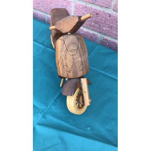 36 - Wooden carved scooter