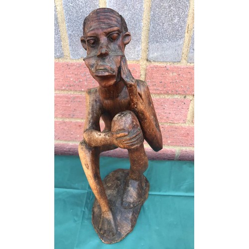 38 - Carved African figure