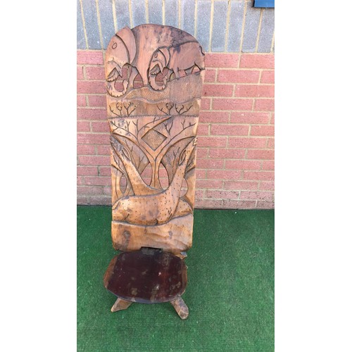 70 - Carved two piece African chair