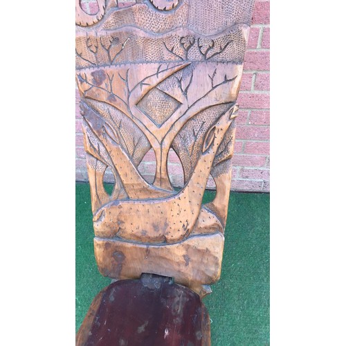 70 - Carved two piece African chair