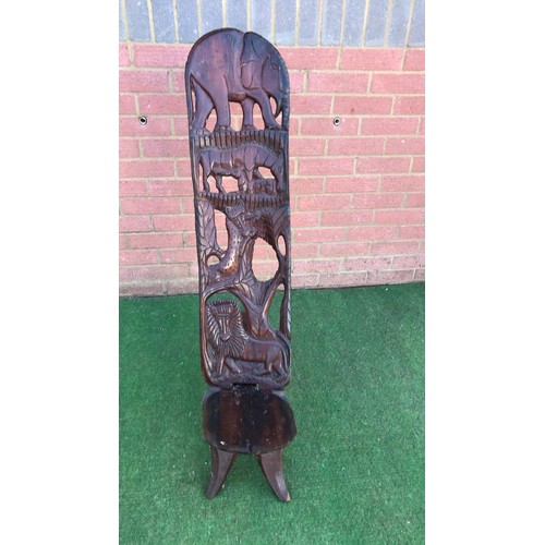 69 - Carved two piece African chair