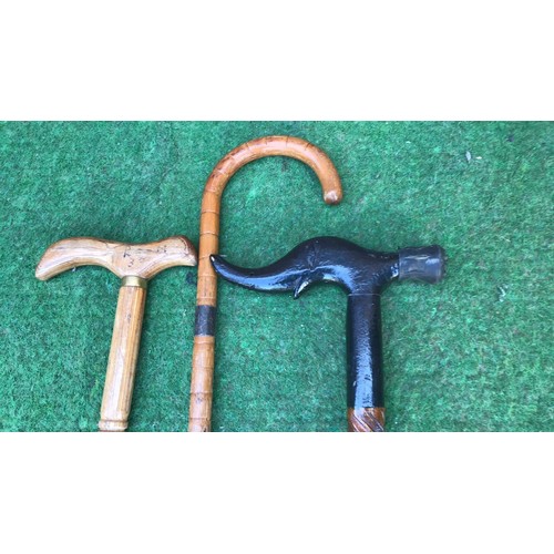 53 - 3 walking canes with shaped handles