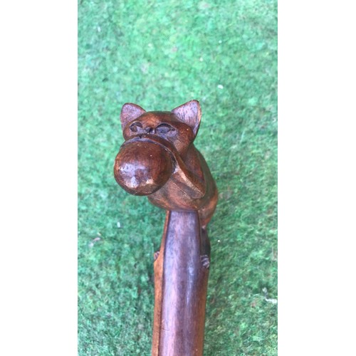 67 - 2 wooden carved walking sticks