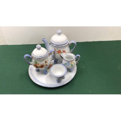 20 - Miniature tea set on stand