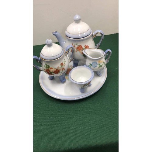 20 - Miniature tea set on stand