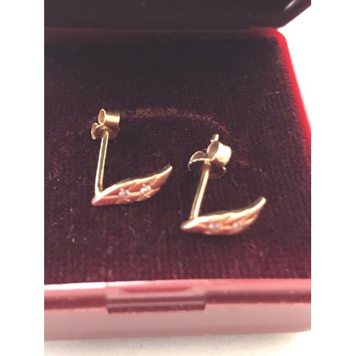 174 - Pair of 14ct gold earrings 0.74g