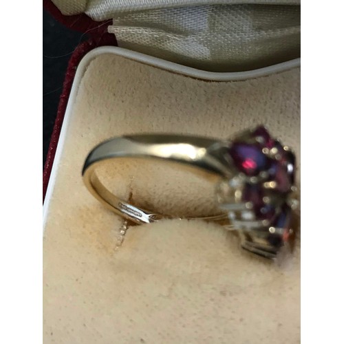 179 - 9ct ring with pink stones weight 3.64g size N/O