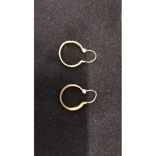 139 - Pair of 14ct gold earrings