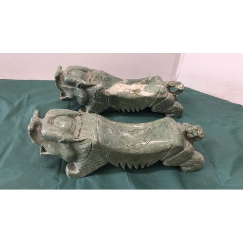 332 - Two large soapstone dogs