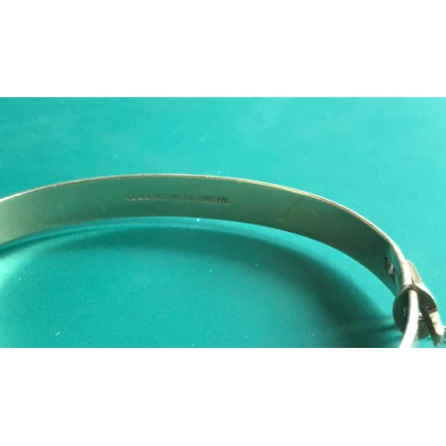 150 - 9ct metal core bangle