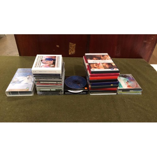 459 - small quantity of mixed Cds and DVDs