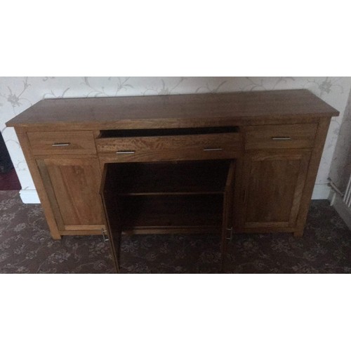 632 - 3 draw 4 door oak sideboard