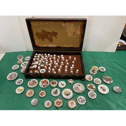 572 - Oak canteen box containing thimbles and miniature plates