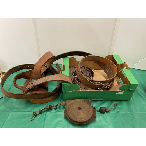 543 - Collection of heavy leather belts & spring loaded wire