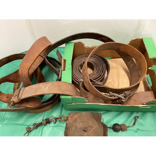 543 - Collection of heavy leather belts & spring loaded wire