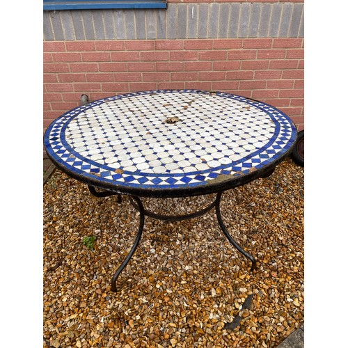 525 - Mosaic tile top garden table on metal legs with wear to tiles see all pictures