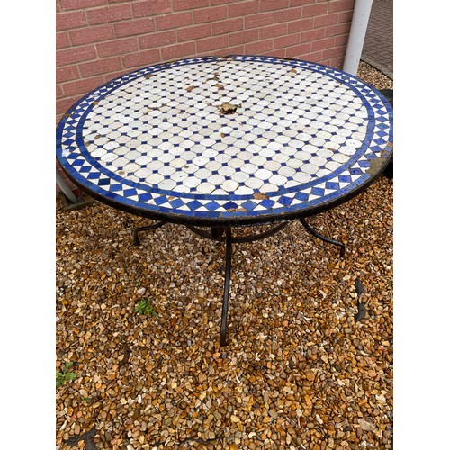 525 - Mosaic tile top garden table on metal legs with wear to tiles see all pictures